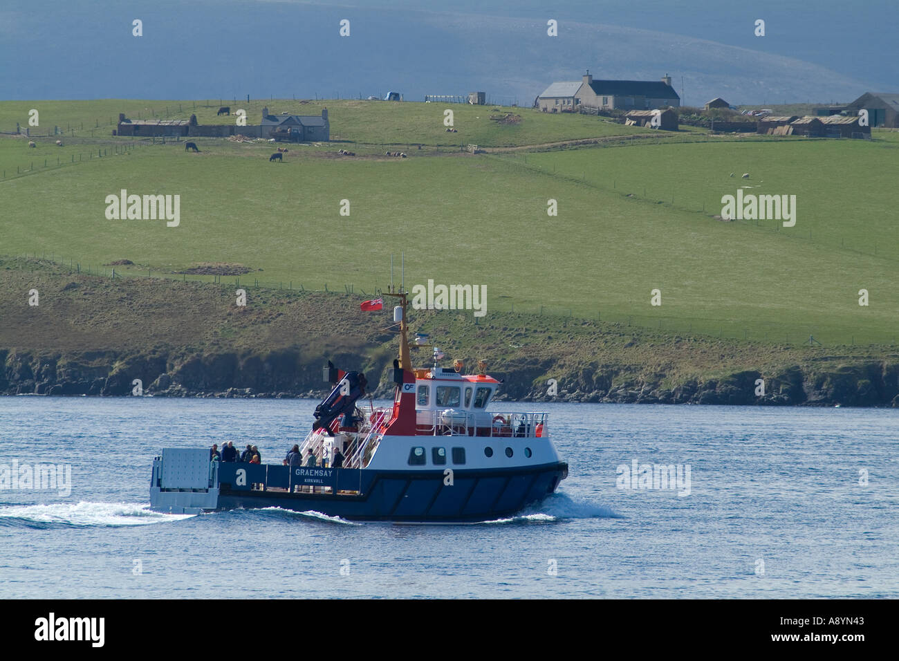 dh Graemsay island HOY SOUND ORKNEY Orkney Ferries MV Graemsay sailing passed shore ferry scotland islands boat isle travel transport Stock Photo