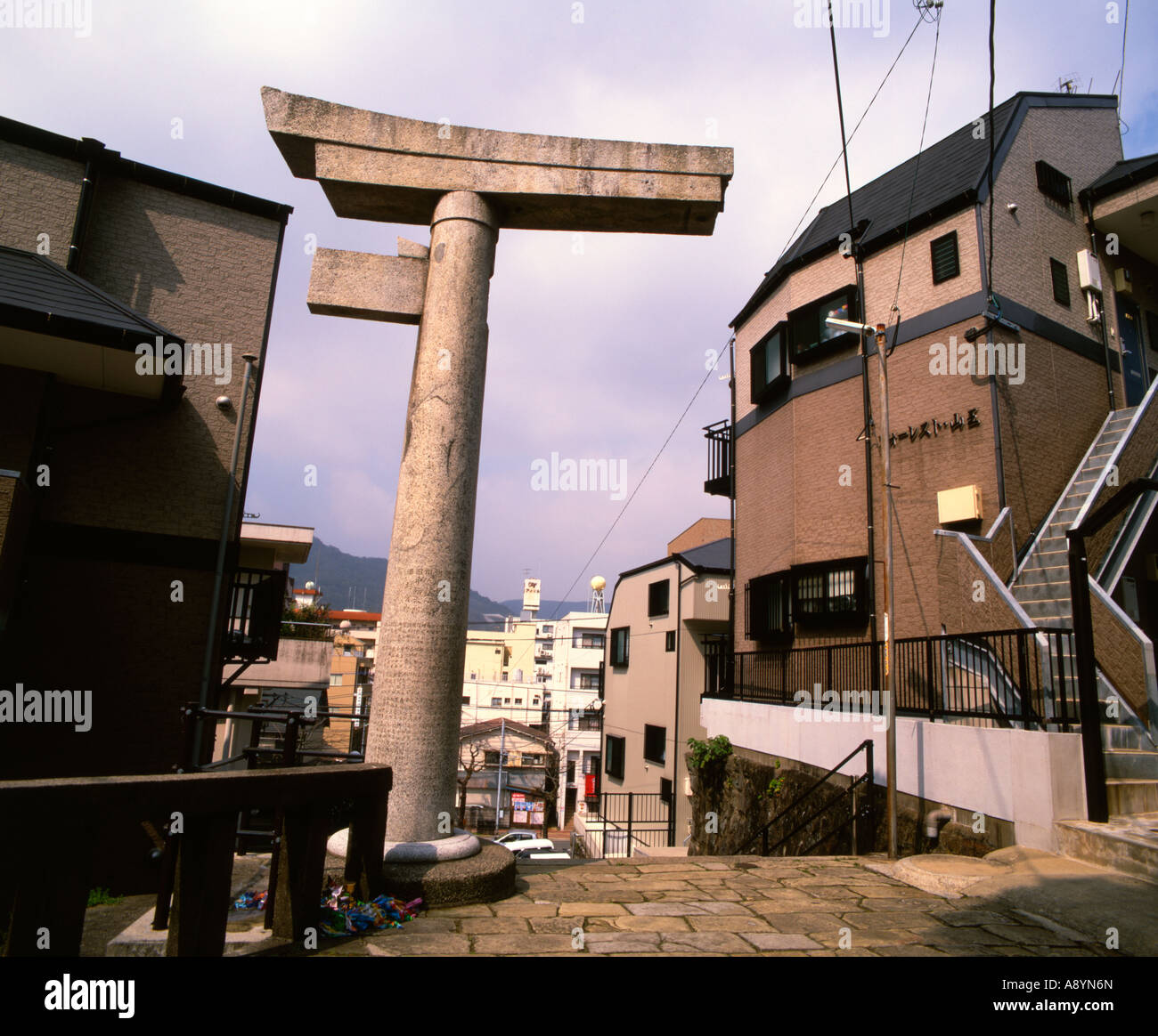 800 meters southeast of the hypocenter the torii gate of the Sanno Shinto Shrine Nagasaki was hit by the blast and split in half Stock Photo