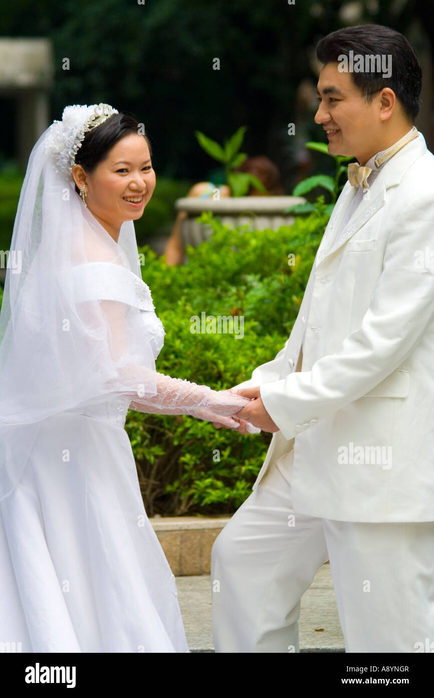 Chinese Couples Pose for Wedding Photos Shamian Island Guangzhou China Stock Photo