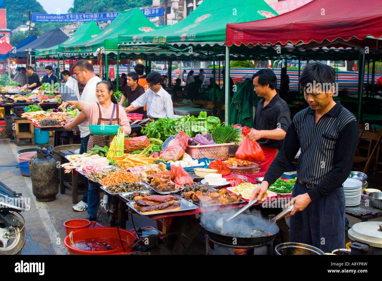 Wok Stirfry Outdoor Restaurants in Tent City Yangshuo China Stock Photo