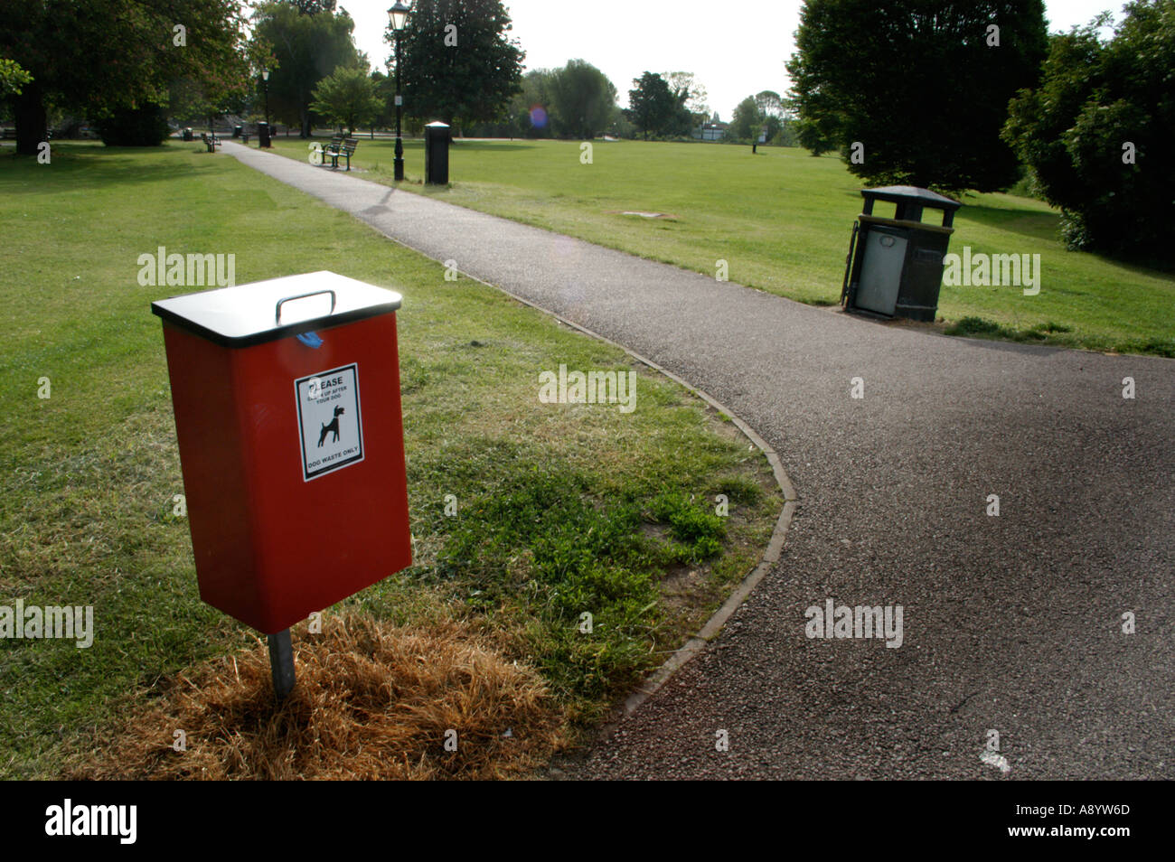 dog pooper scooper and litter bin in a park uk Stock Photo Alamy