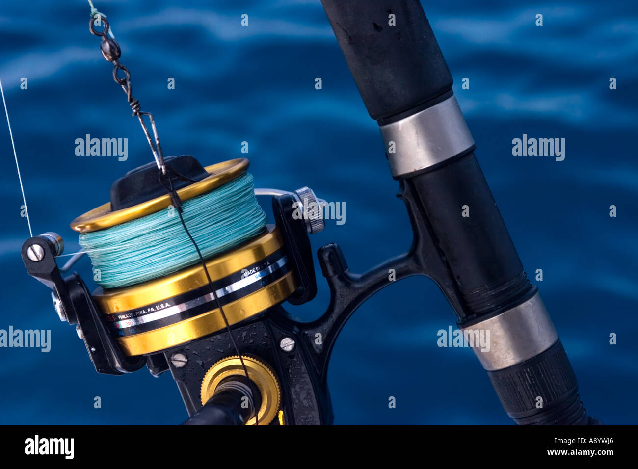 Fishing reel open face heavy duty Stock Photo - Alamy