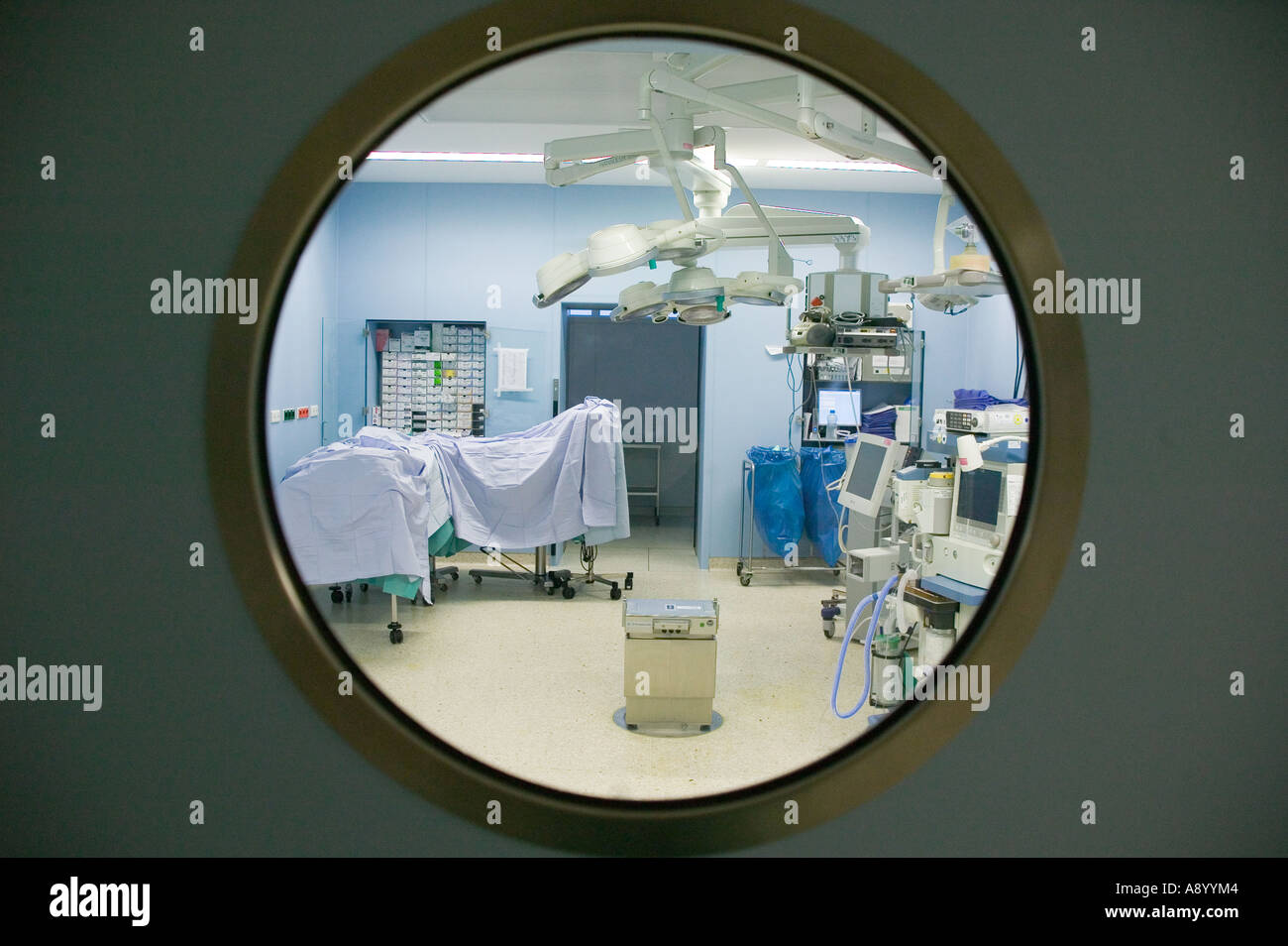 view through round window into modern surgery Stock Photo