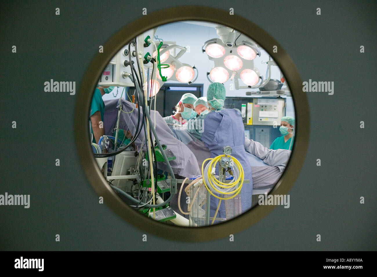 view through round window into modern surgery Stock Photo