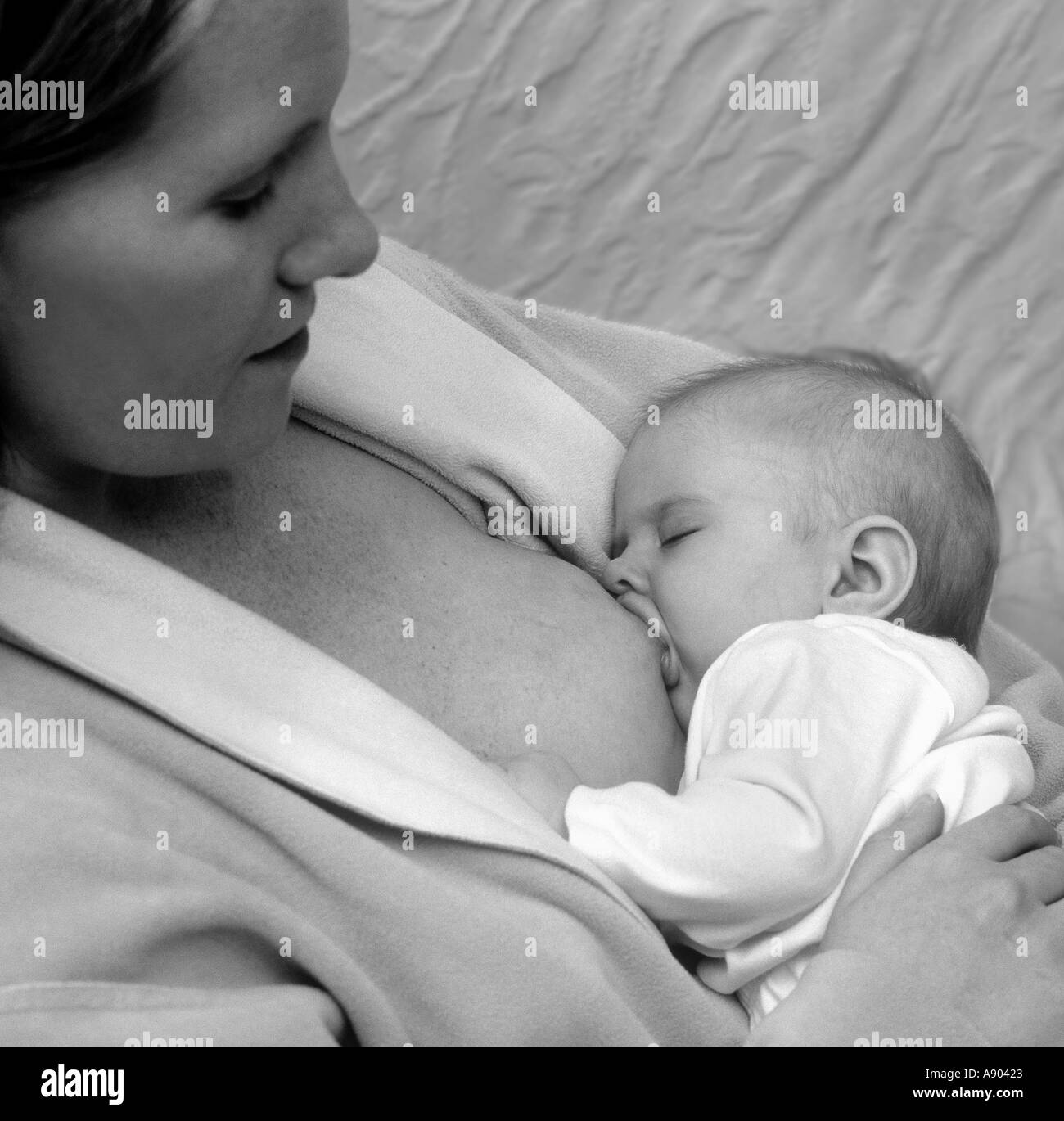 Mother Breastfeeding Baby Daughter Stock Photo