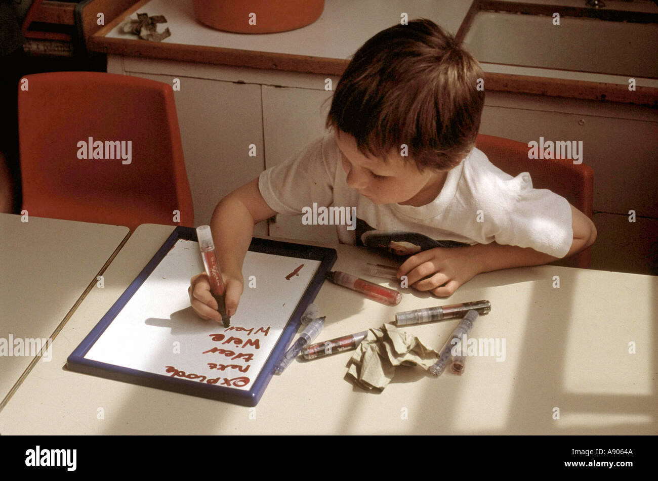 Primary school child learning to write stock photo alamy