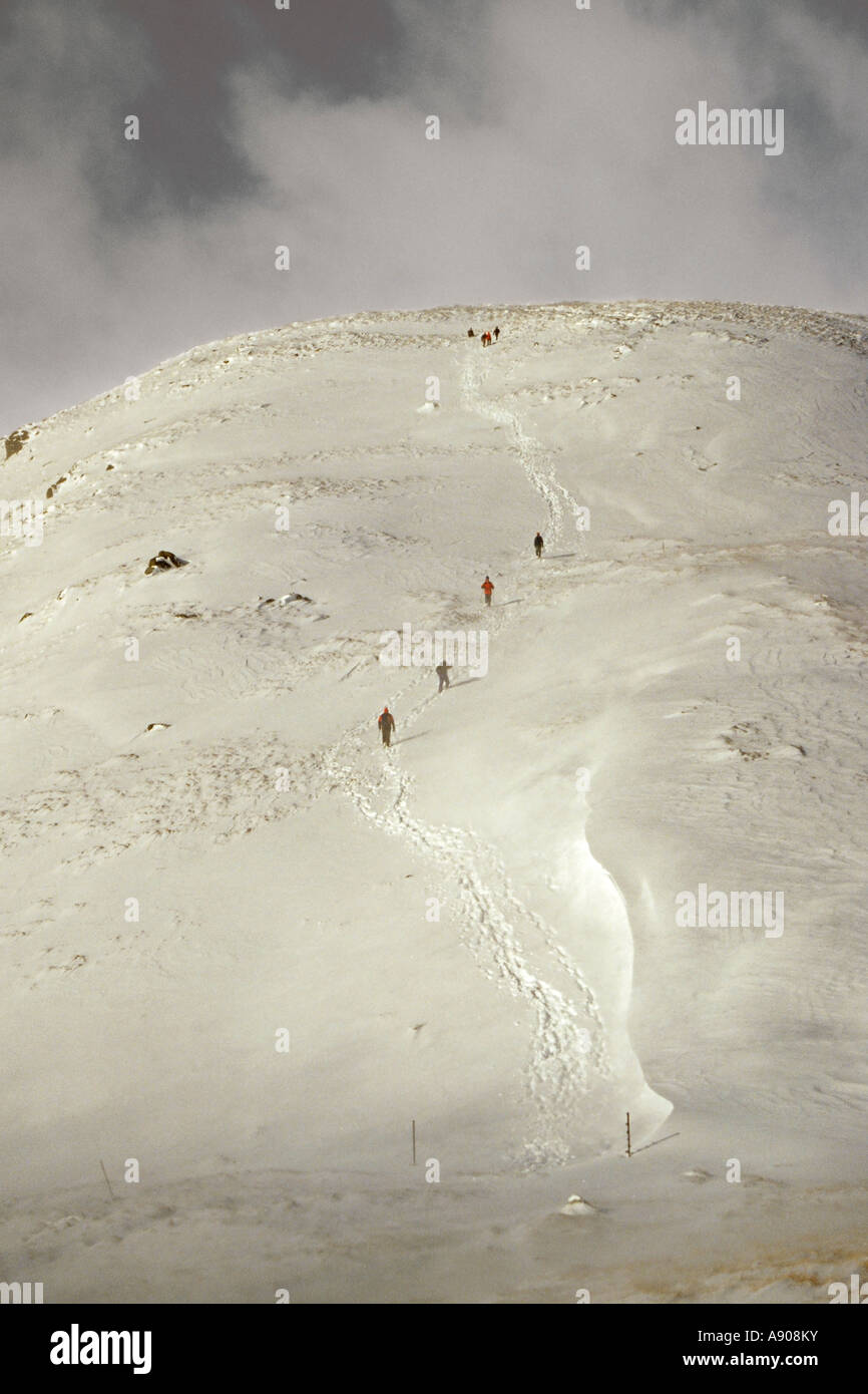 A group of hillwalkers climbing Ben Ledi near Callander Stock Photo
