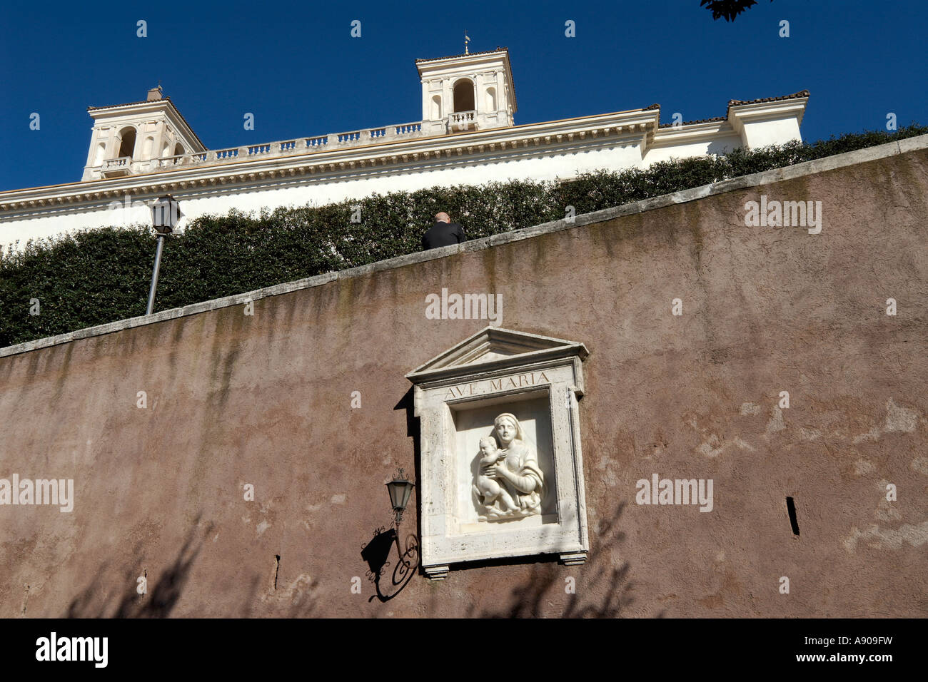 Rome Italy Villa Medici and Madonna set into the wall of the Rampa S Sebastianello Stock Photo