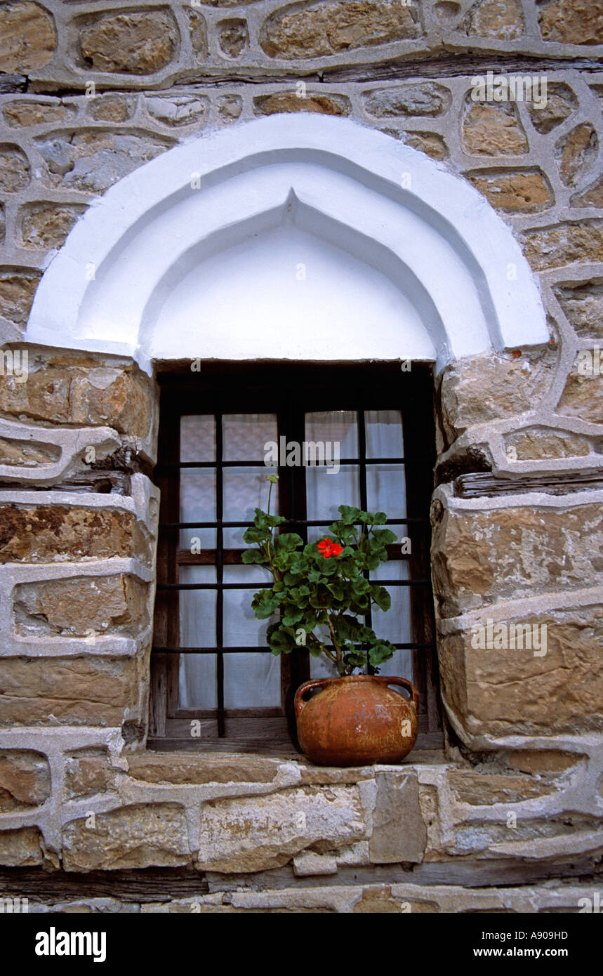 Window and plant pot, Arbanassi, Bulgaria Stock Photo