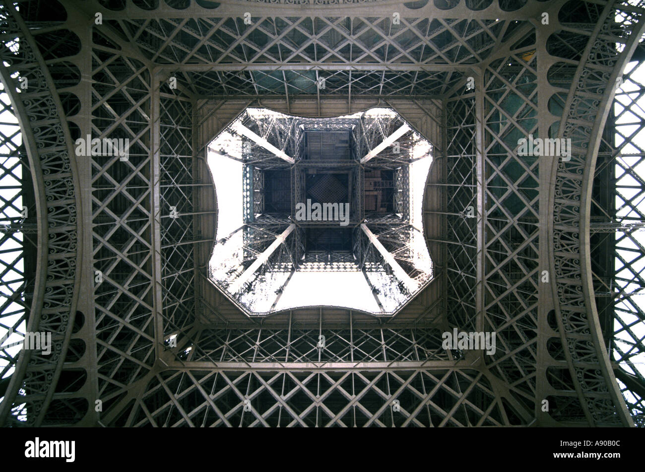 Paris symmetrical view skywards from directly underneath the Eiffel tower France EU Stock Photo