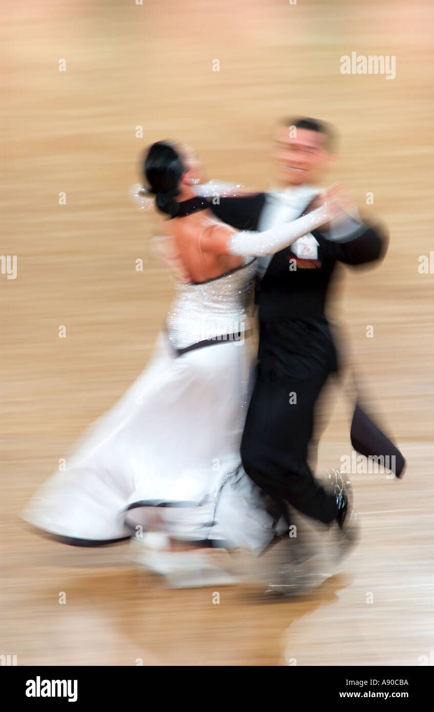 Professional Ballroom Dancers Performing In The Standard Dance