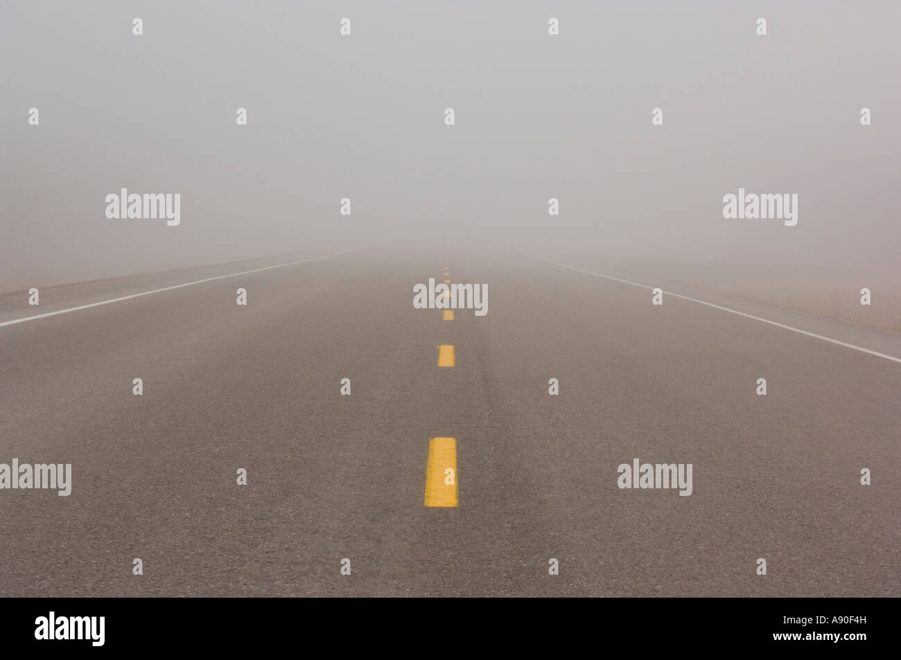 A straight section of a Misty Highway Stock Photo