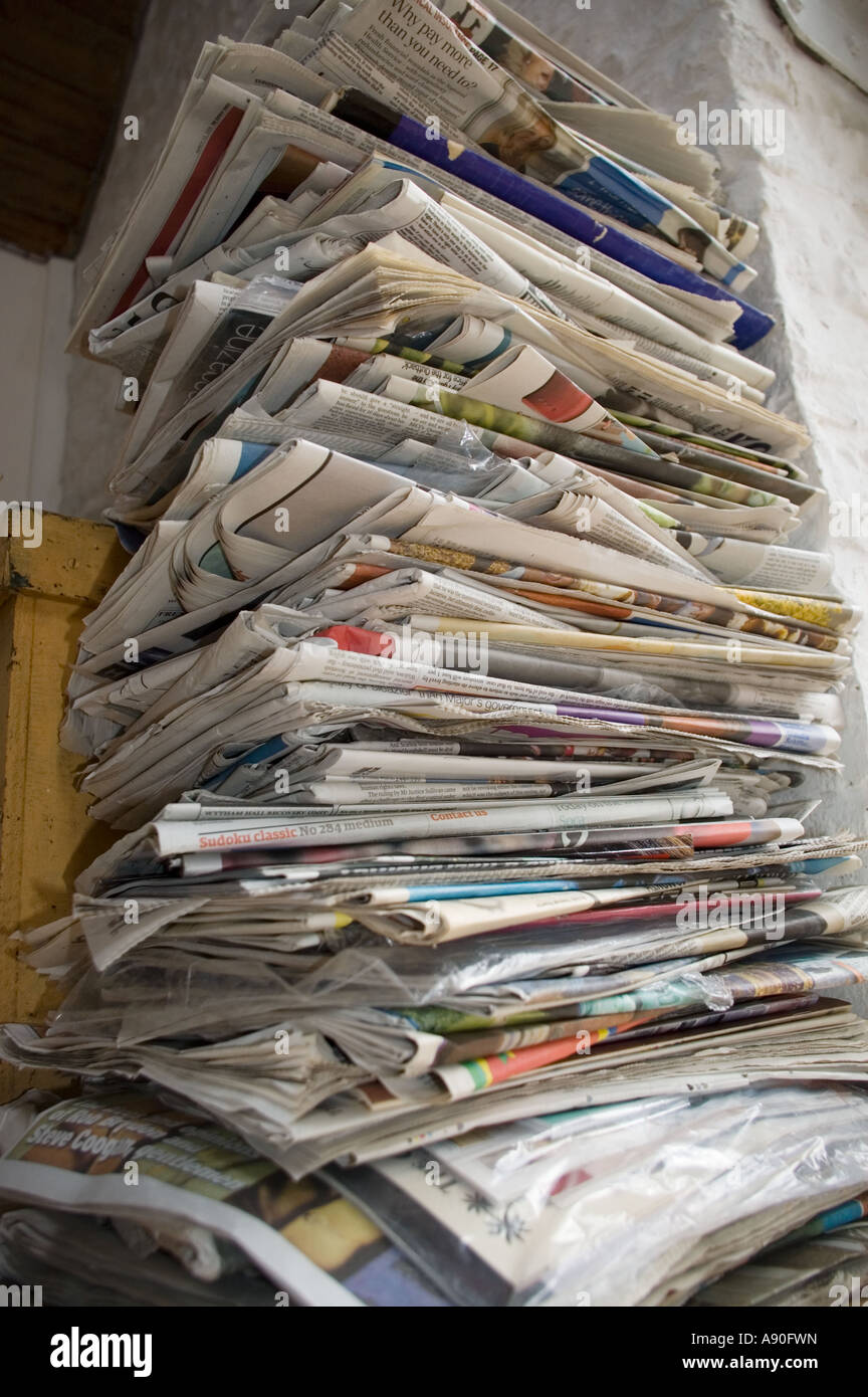 Stack of used newspapers Stock Photo - Alamy