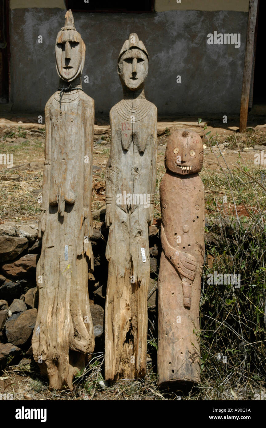 Three ancient wooden totem figures museum Konso Ethiopia Stock Photo
