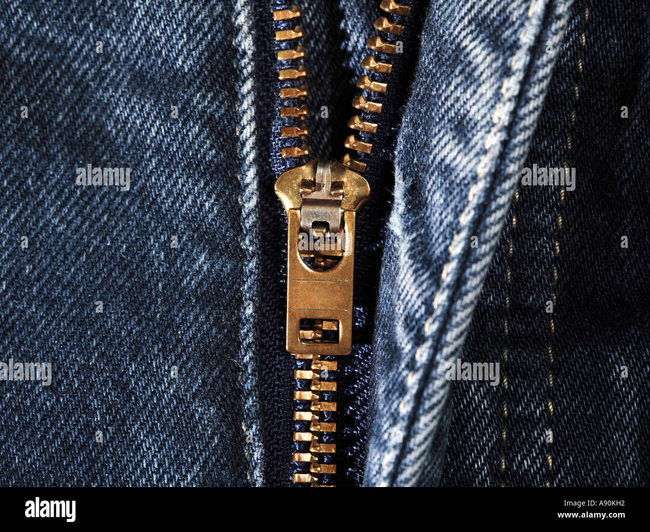 Blue denim jeans zip zipper Stock Photo - Alamy