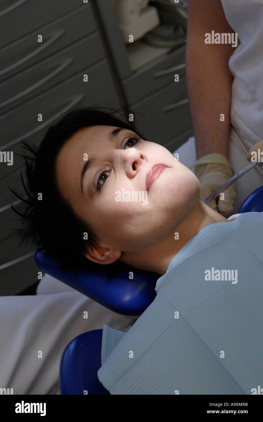 Young lady at the dentist - Junge Frau beim Zahnarzt Stock Photo