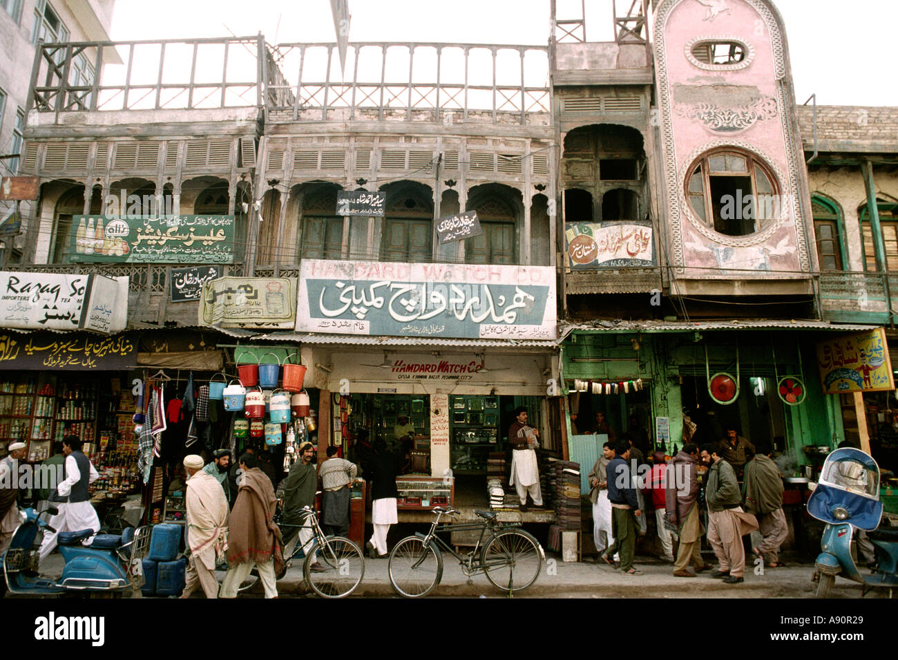 Pakistan NWFP Peshawar Qissa Khawani Bazaar pavement and shop fronts Stock Photo