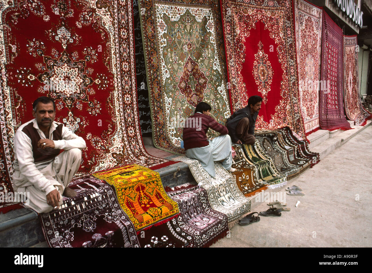 Pakistan NWFP Peshawar Qissa Khawani Bazaar carpet sellers Stock Photo