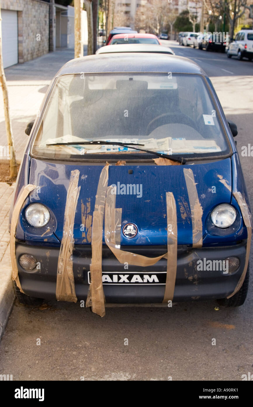 Palma de Mallaorca old car fixed with tape Stock Photo