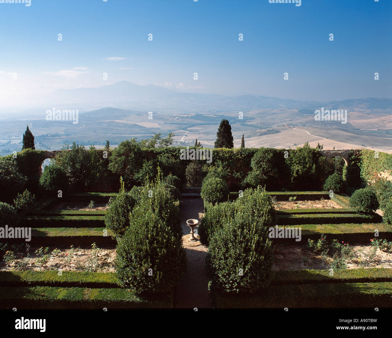 Palazzo Piccolomini, Pienza, Tuscany, Italy. The view from the piano nobile (first floor) overlooks the formal Renaissance garden and the Val d'Orcia Stock Photo