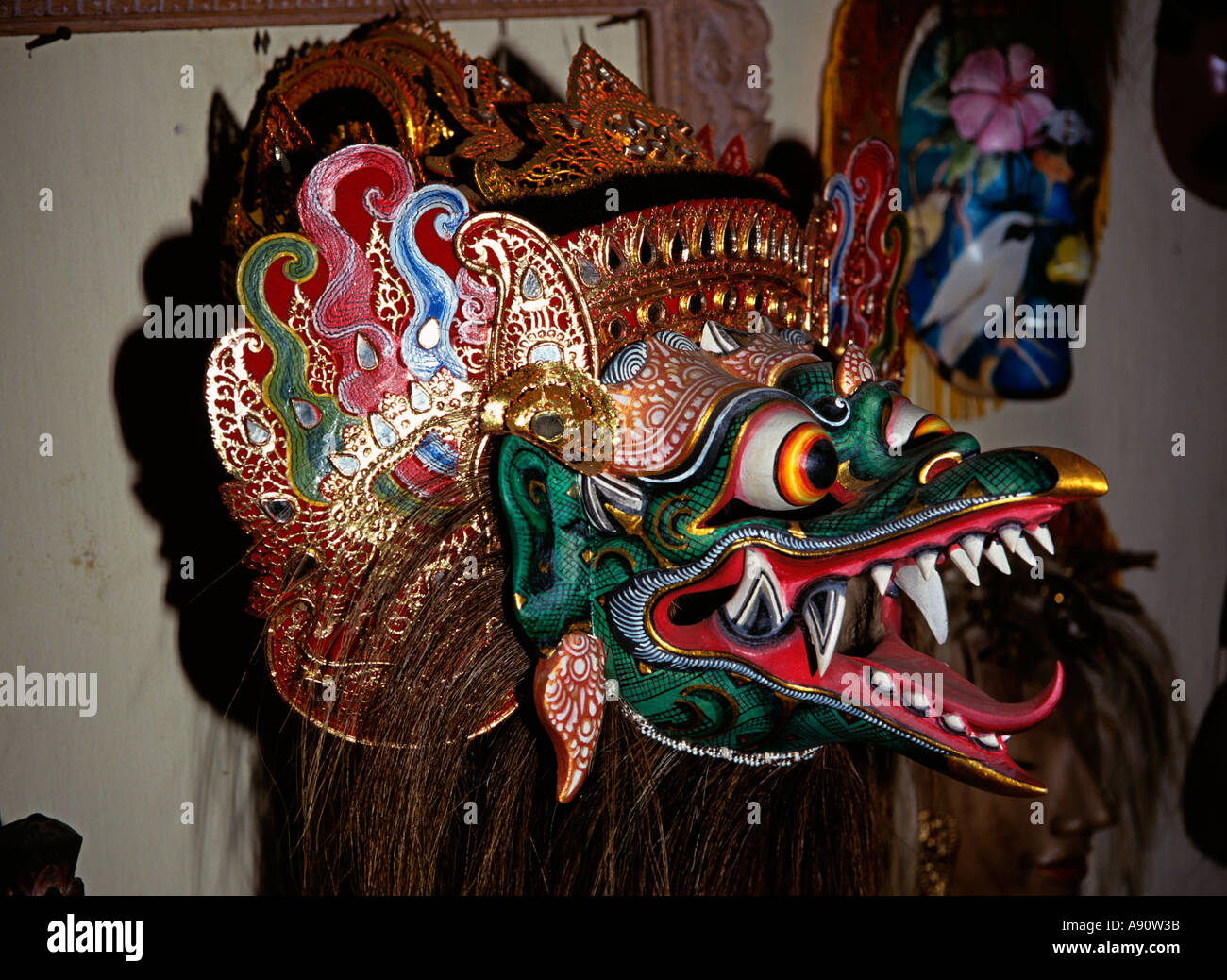 Indonesia Bali Crafts Mas Garuda carved mask by I B Sutarja Stock Photo -  Alamy