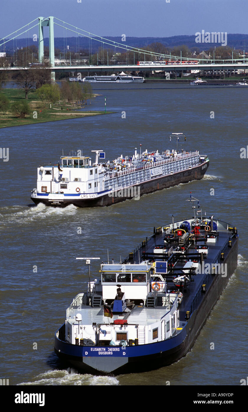 Oil and gas tanker barges on the river Rhine, Cologne, North Rhine-Westphalia, Germany. Stock Photo