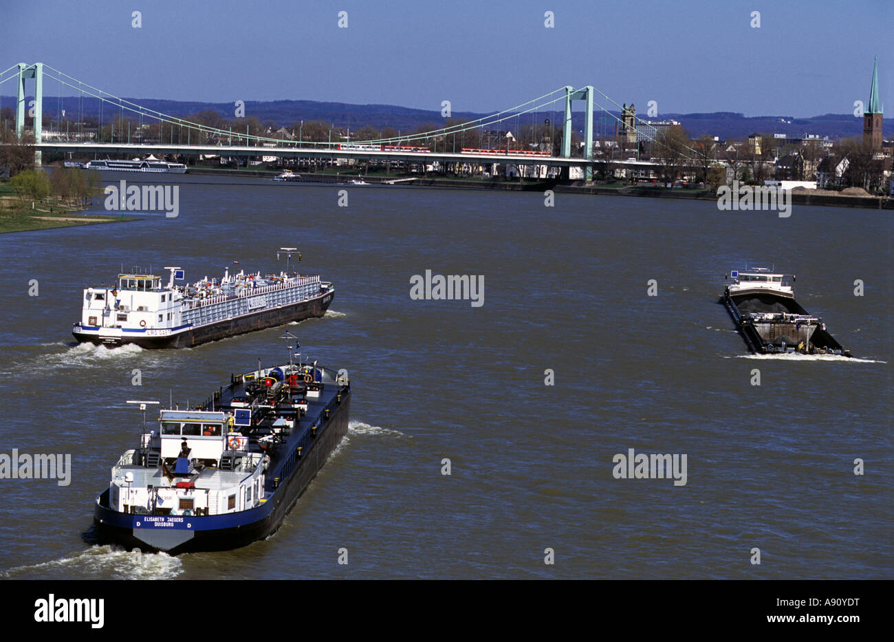 Oil, gas and coal barges on the river Rhine, Cologne, North Rhine-Westphalia, Germany. Stock Photo
