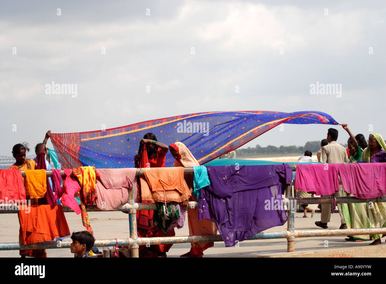 indian-woman-washing-clothes-outside-hi-res-stock-photography-and