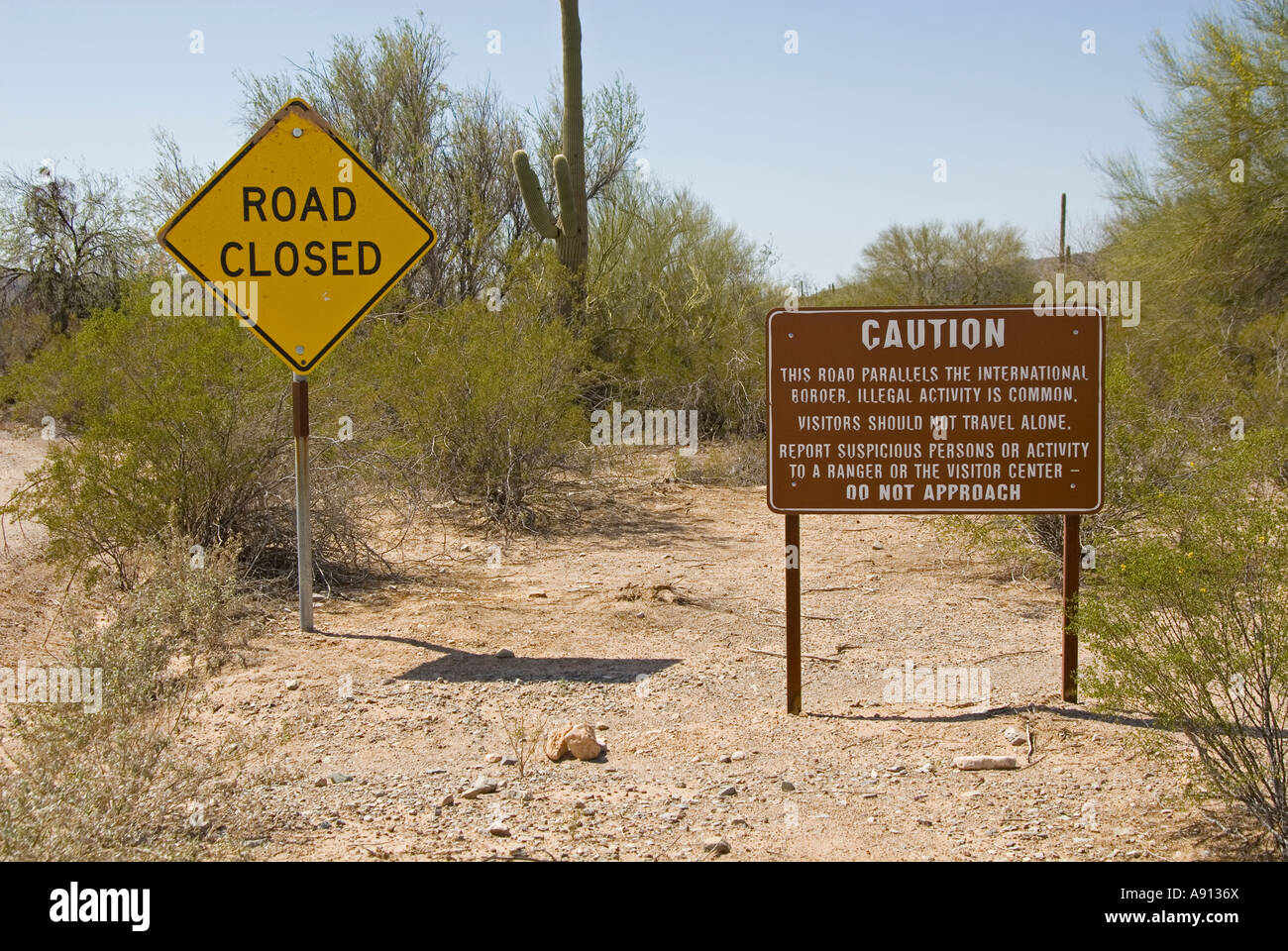 warning-signs-near-international-border-lukeville-arizonausa-near-A9136X.jpg