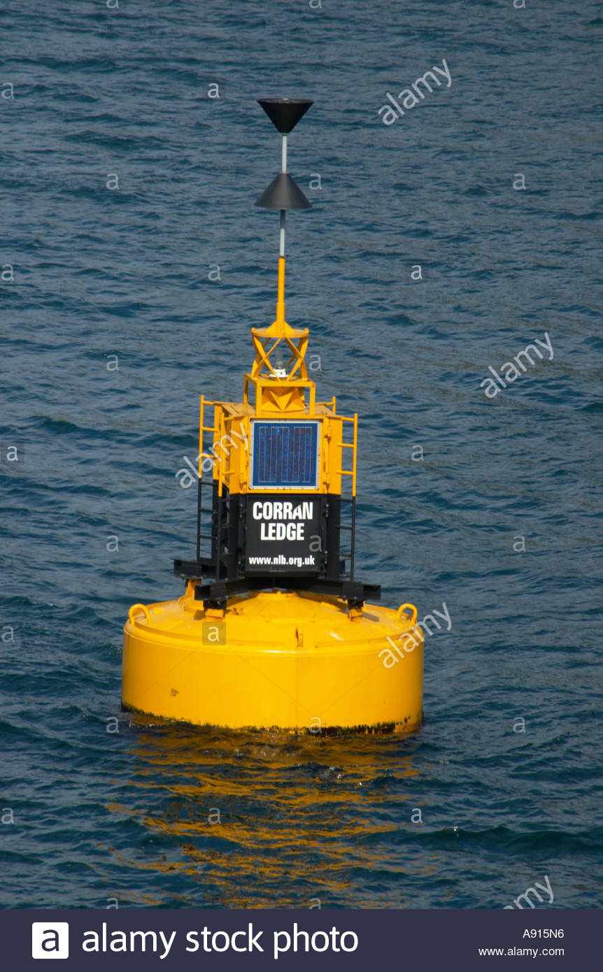 A yellow warning buoy at sea Stock Photo Alamy