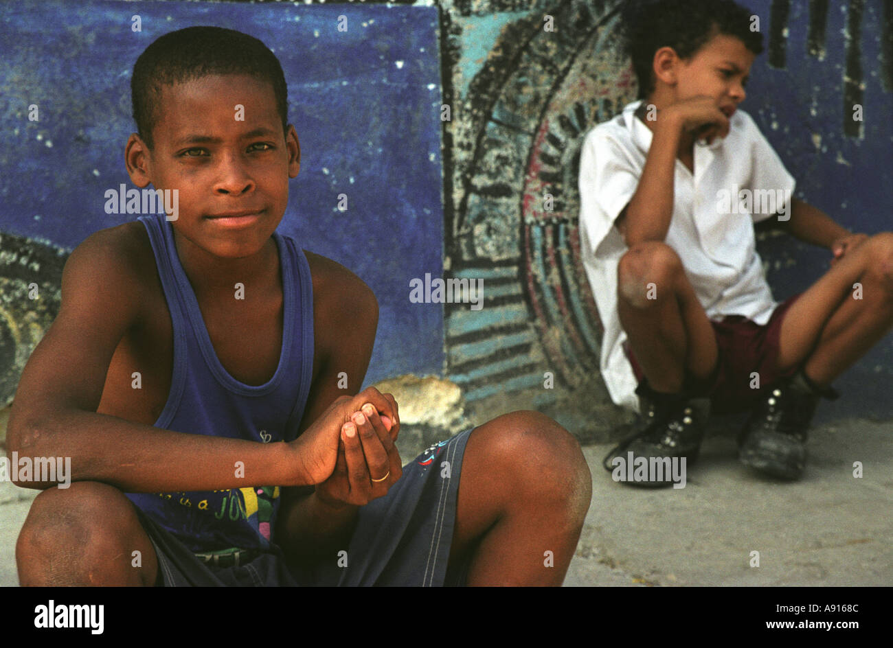 Portrait of Cuban boy playing marbles in calle jon de hamel havana Stock Photo
