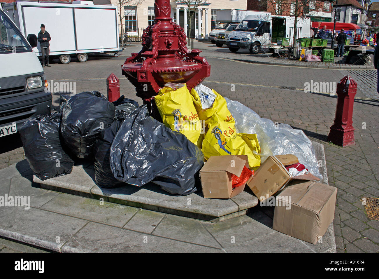 Plastic Refuse Bags awaiting collection after market day Stock Photo