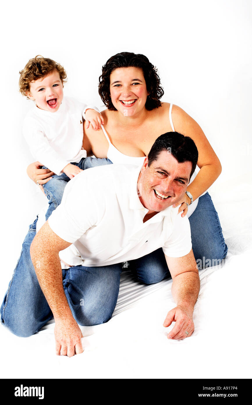 Happy family white backdrop hi-res stock photography and images - Alamy