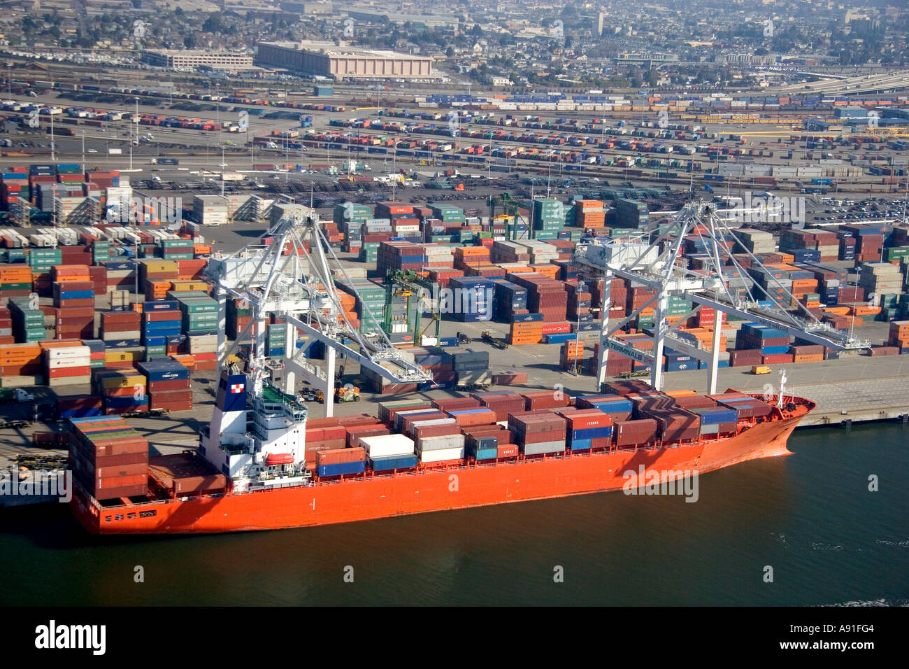 Container ships and cranes at the Port of Oakland, in the bay area of ...