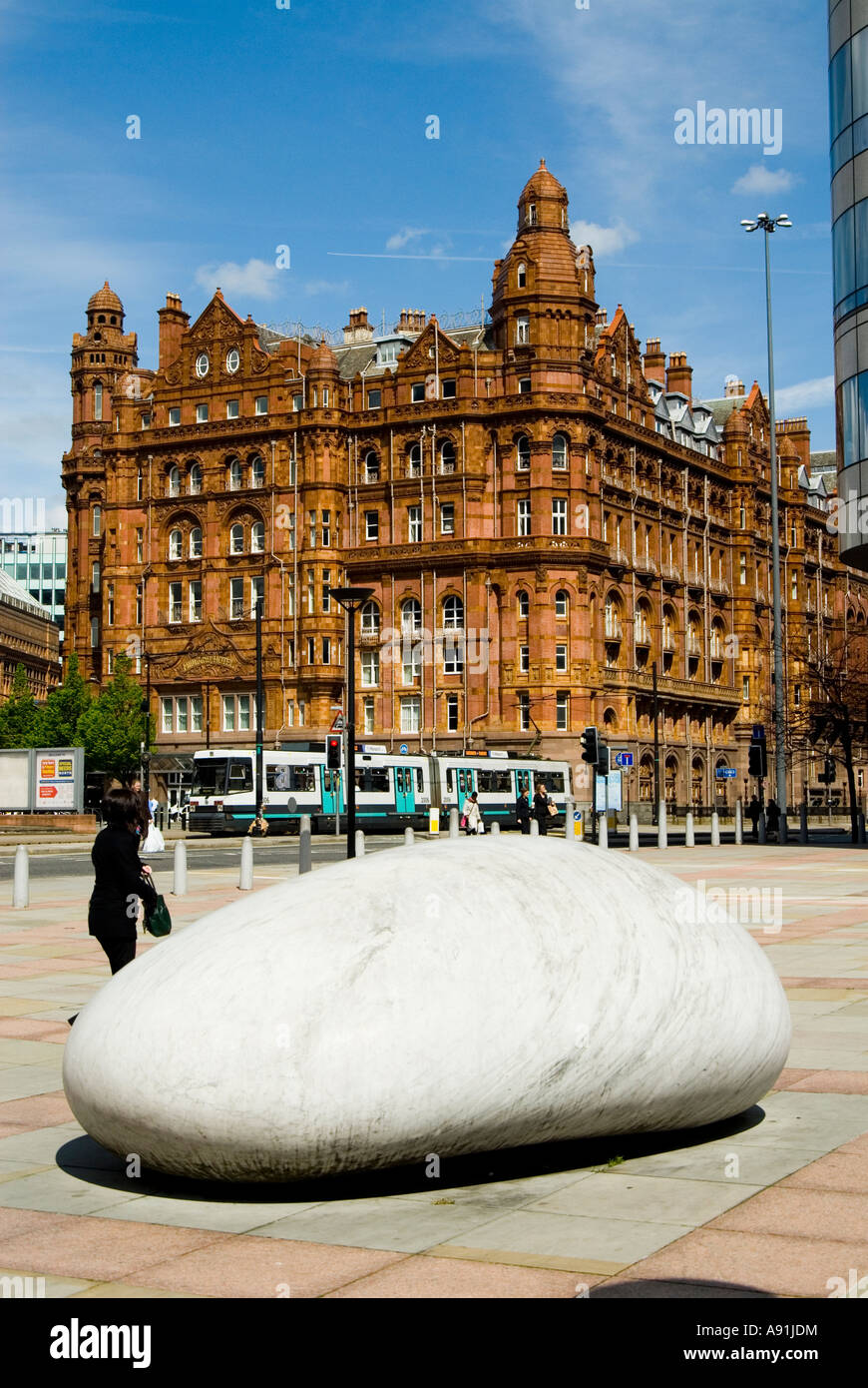 The polished marble pebble Touchstone with Midland hotel in Manchester City Centre UK Stock Photo