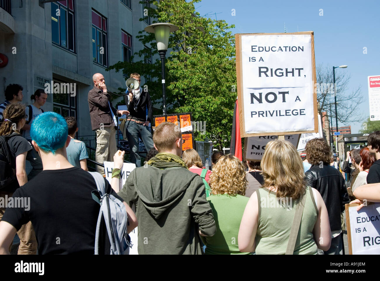 Education is A Right not a privilege sign in students protest Stock Photo