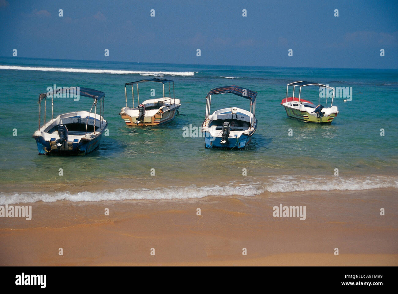NMJ99777 Four Boats Sea beach Sri Lanka Ceylon Stock Photo Alamy
