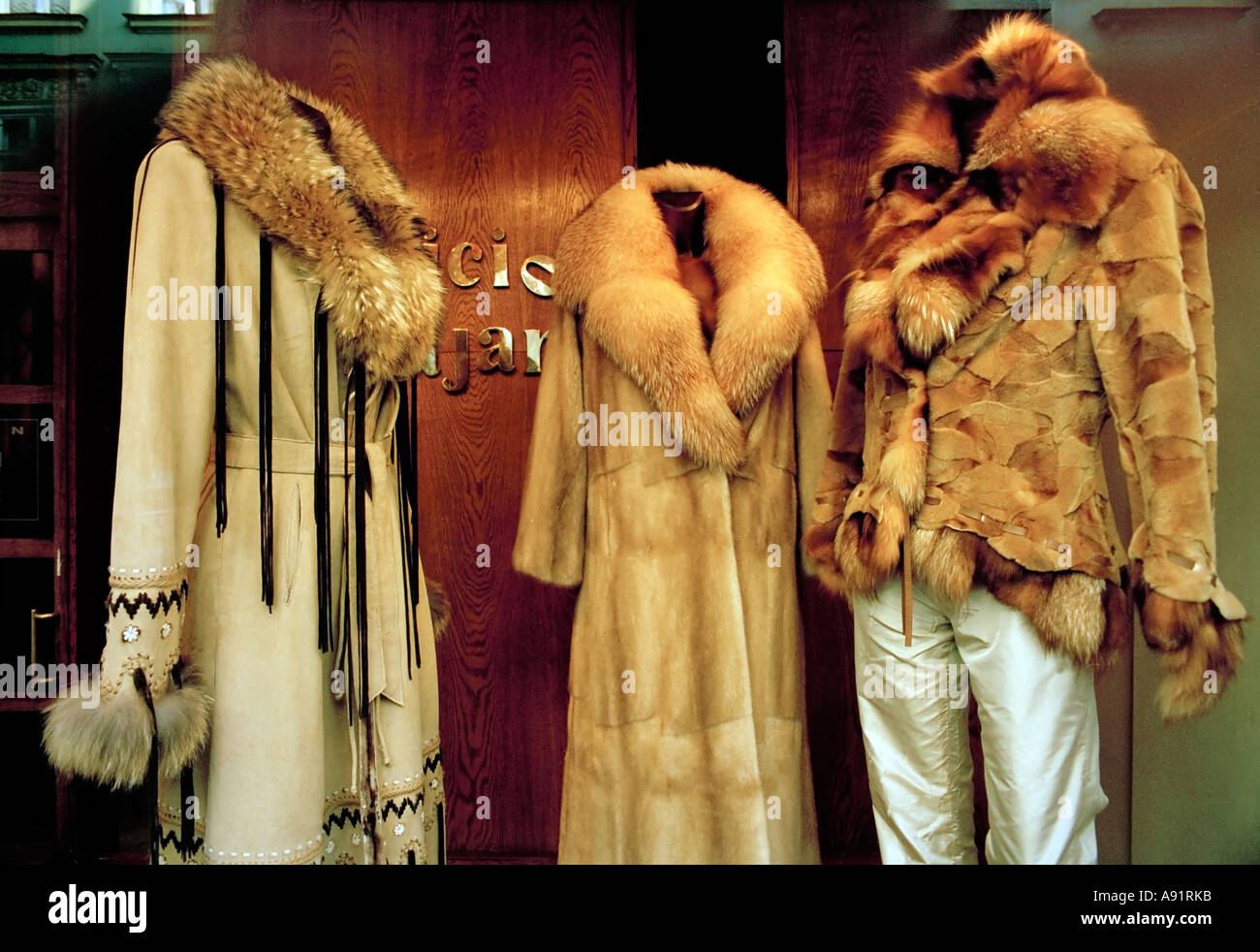furs in shop window Stock Photo Alamy