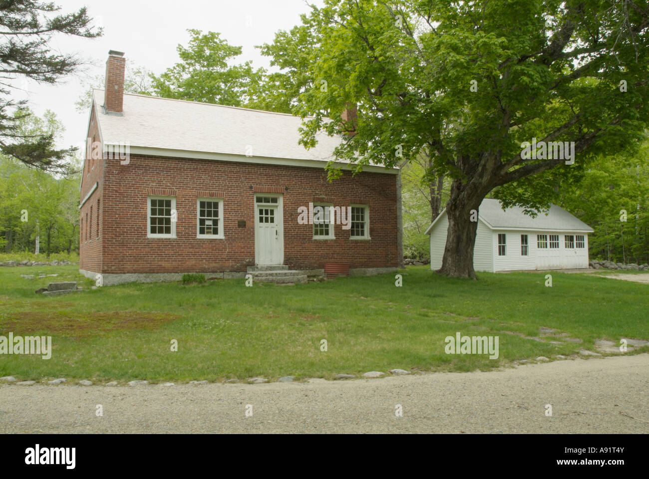 Brickett Place in Stow Maine USA.19th century historic brick farmhouse