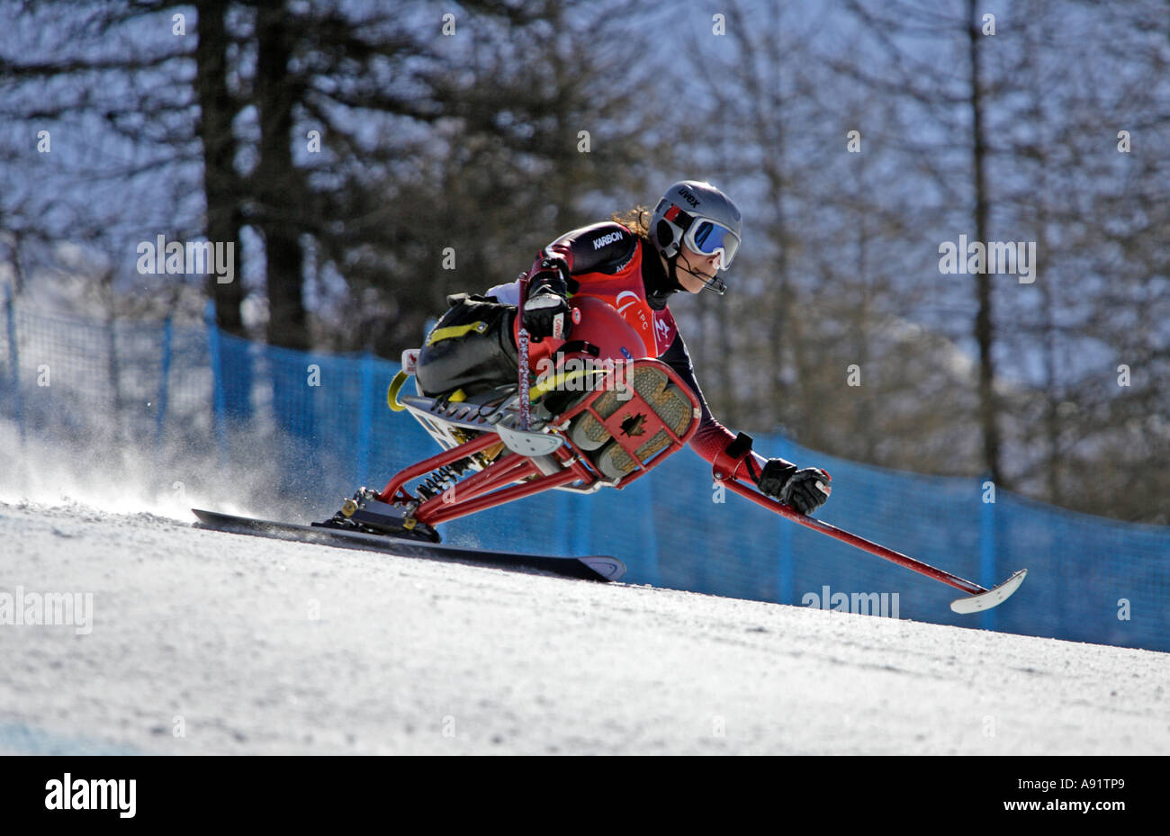 Kimberley Joines LW12 1 of Canada in the Womens Alpine Skiing Super G Sitting competition on her way to winning the bronze medal Stock Photo