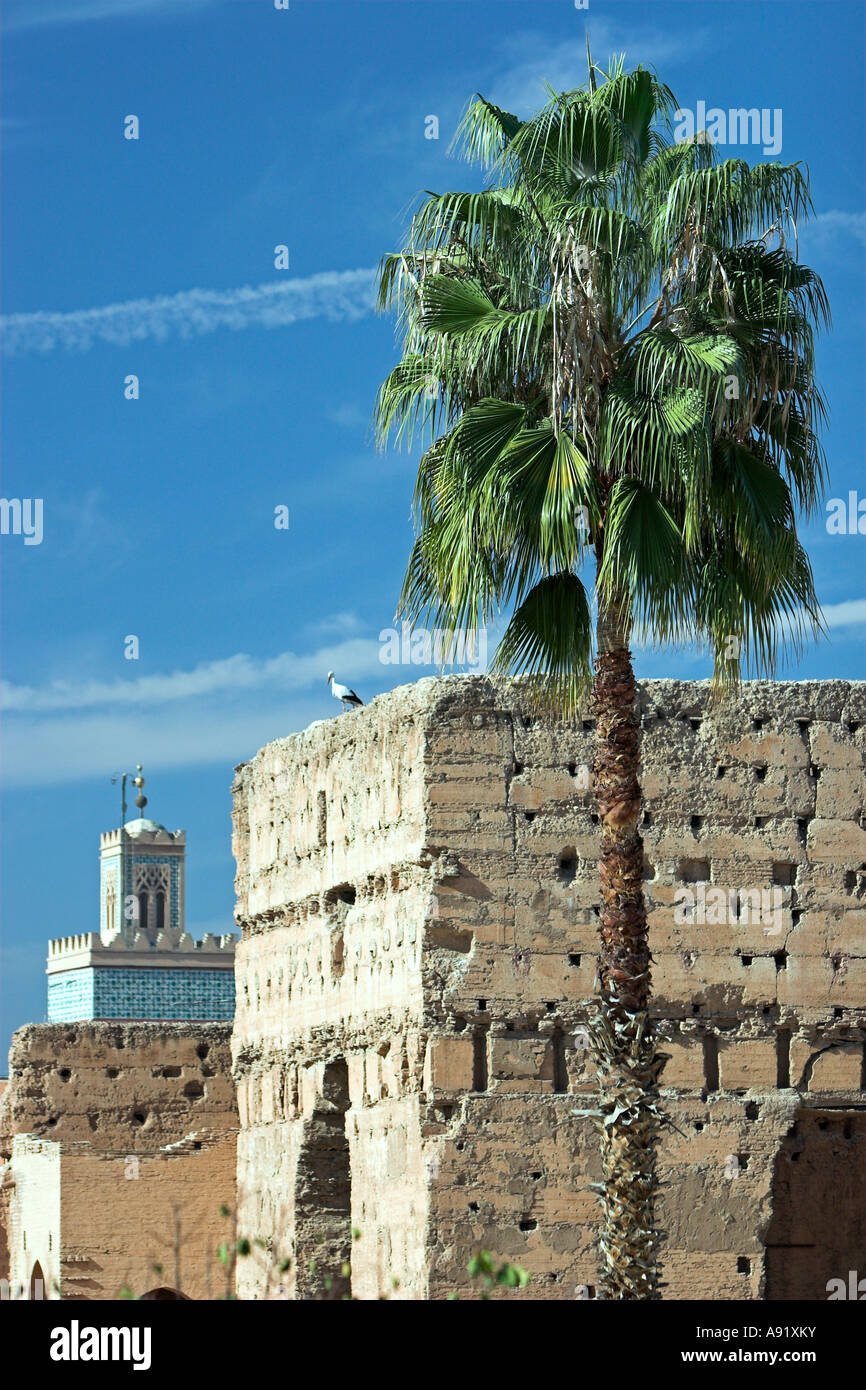 Minaret and jet aircraft contrails in Palais el Badi view Marrakech Morocco Stock Photo
