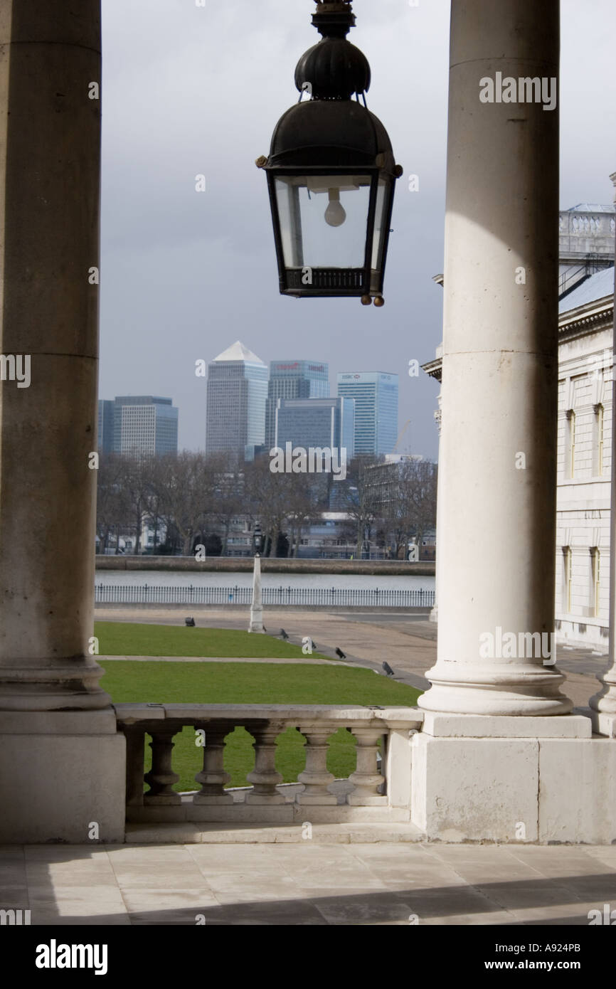 Canary Wharf seen through colums of of the Royal Naval College, Greenwich, London, England, Europe. Stock Photo