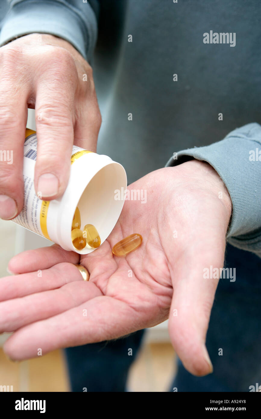 Supplement Tablets in Elderly Hands Stock Photo Alamy