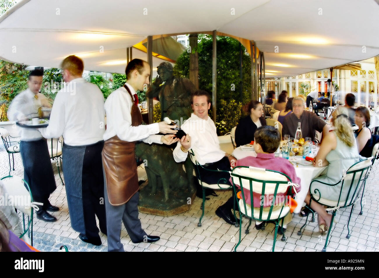 PARIS France, Waiter Serving Clients at Contemporary French Restaurant "La Terrasse du Parc