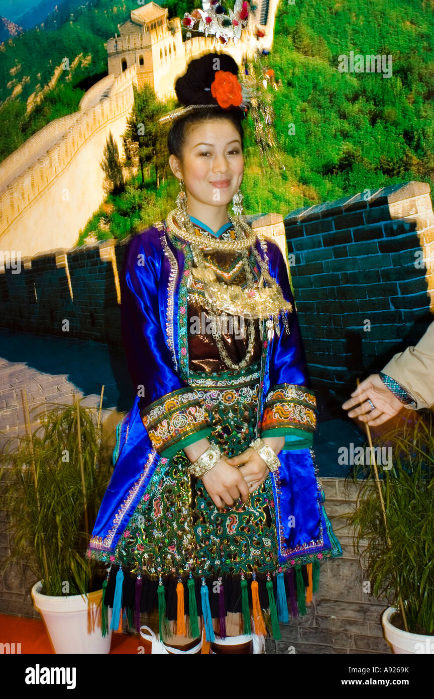 Chinese Woman In Traditional Costumes At Paris Tourist Trade Show Stock Photo Alamy