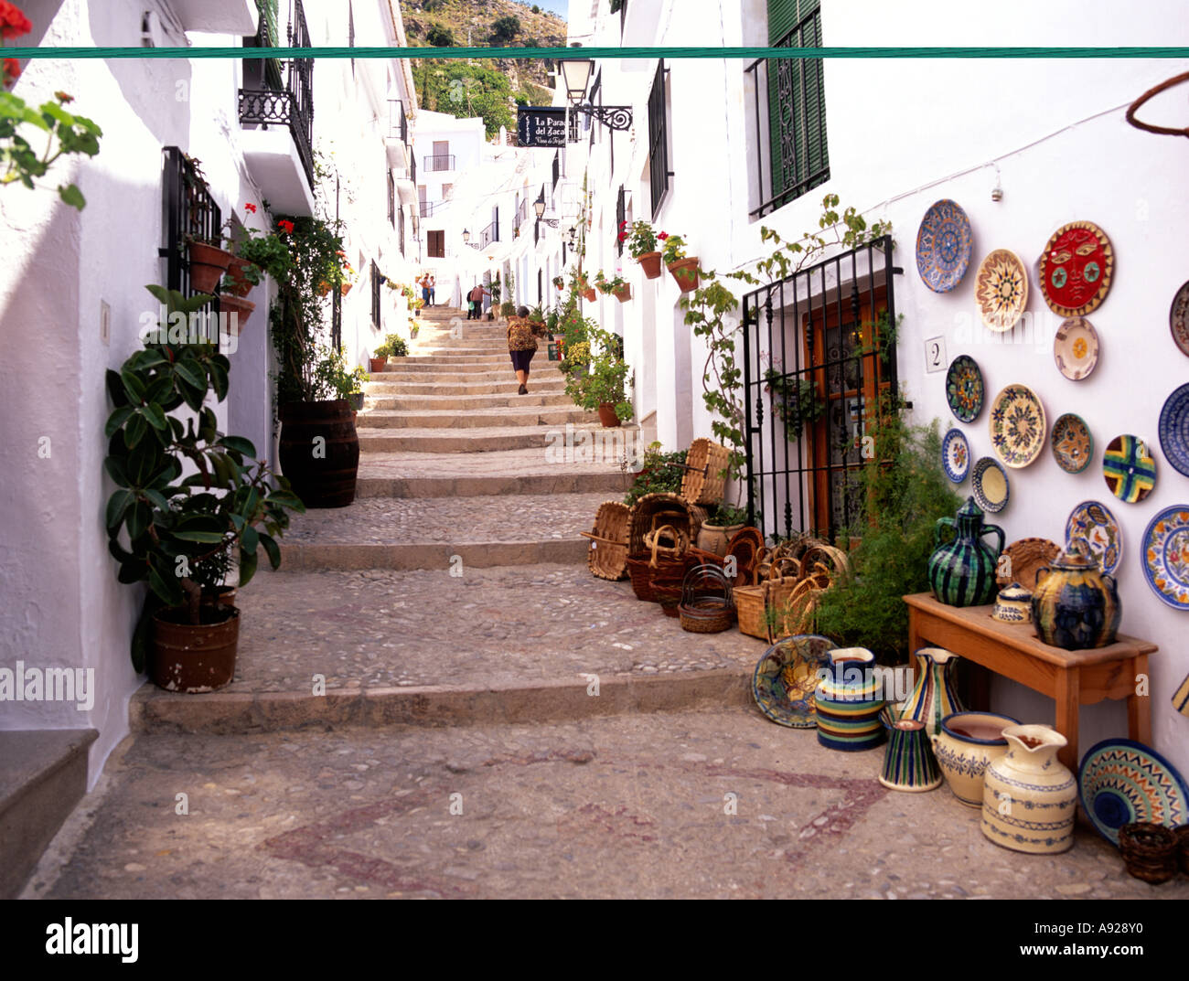 A street of steps in the picturesque white town of Frigiliana, near Nerja, Malaga, southern Spain Stock Photo