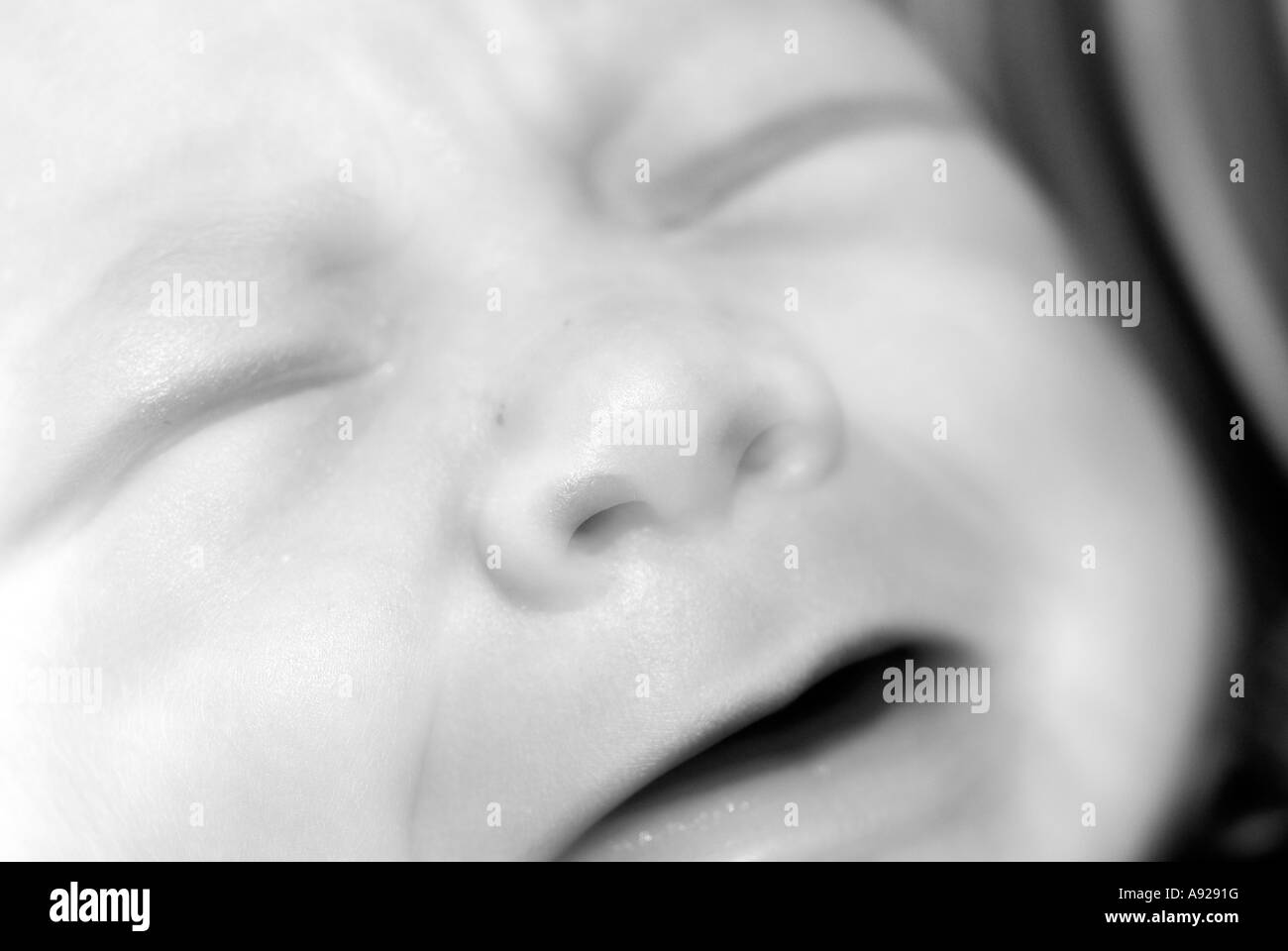 Baby crying, close-up Stock Photo