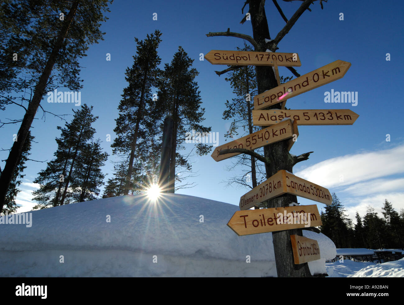 Funny wooden signpost Stock Photo - Alamy