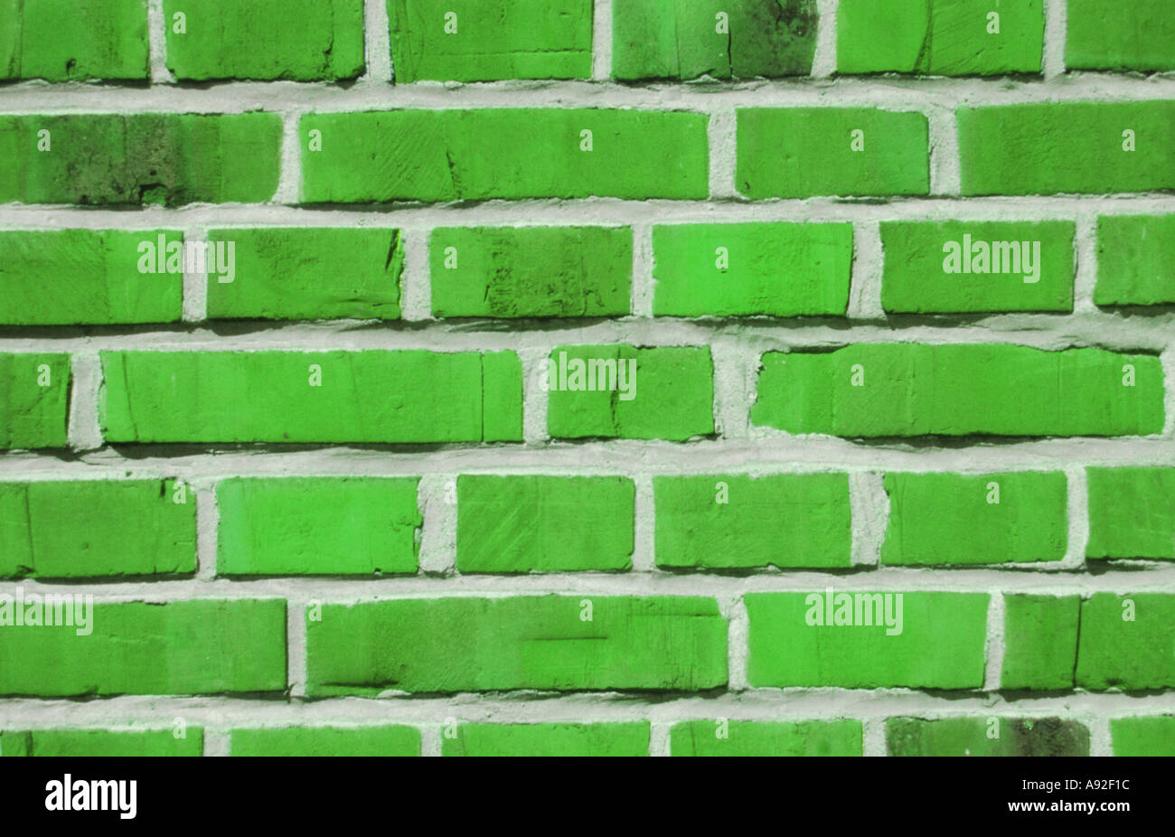 Background green brick wall Stock Photo - Alamy
