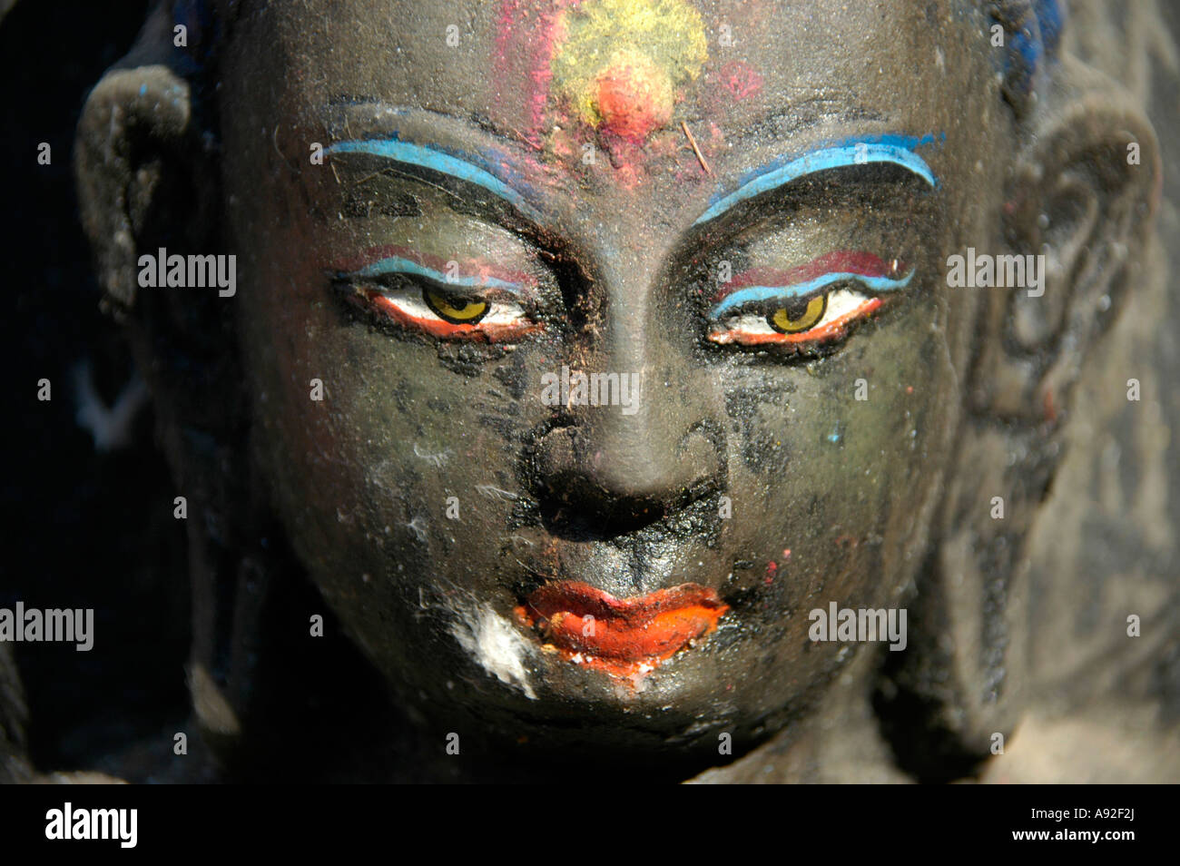 Coloured face of a Buddha figure Kathesimbhu Stupa Kathmandu Nepal Stock Photo